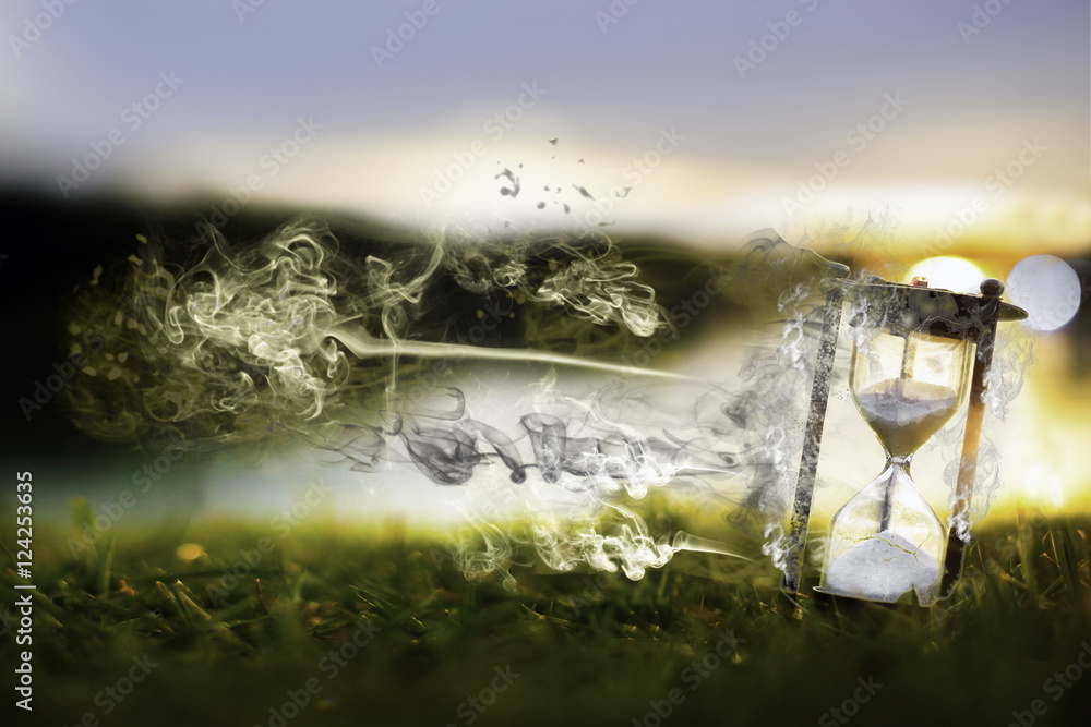 Time is passing (Hourglass in the dawn time)