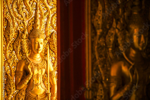 the perforate on the door in public temple in Thailand  this picture is generic art in Thailand it is not trademark in this picture