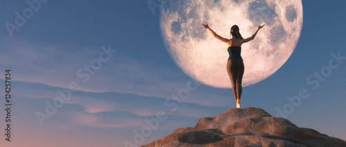 The young female watching the  moon. photo