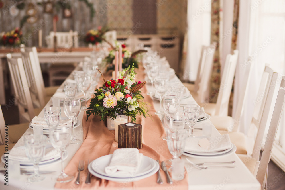 floral decoration on the table at wedding reception