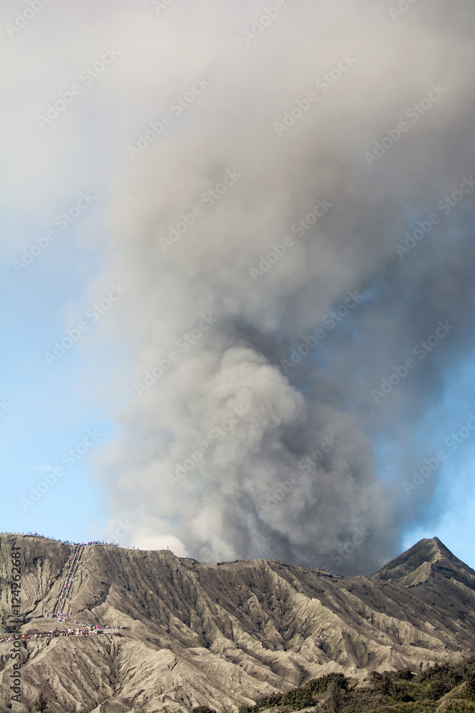 Mount Bromo spewing volcanic ashes from its crater at Bromo-Tengger-Semeru National Park, East java, Indonesia