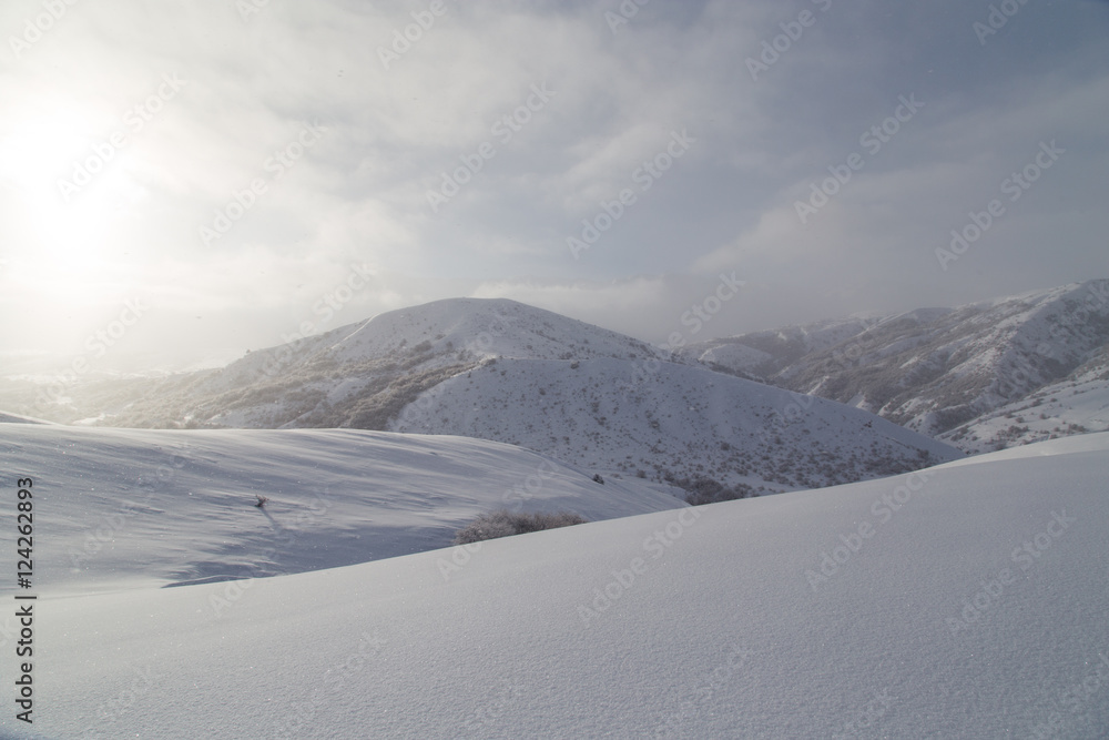dawn sun in the snowy mountains dawn sun in the snowy mountains