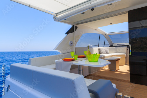 lunch on motor yacht, Table setting at a luxury yacht. © Andrea