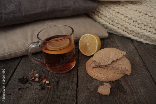 comfort and tea with lemon and biscuits. winter and autumn are pleasantly warm tea.