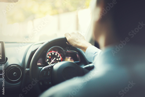 Close-up of Young man driving on the road - vintage tone © twinsterphoto
