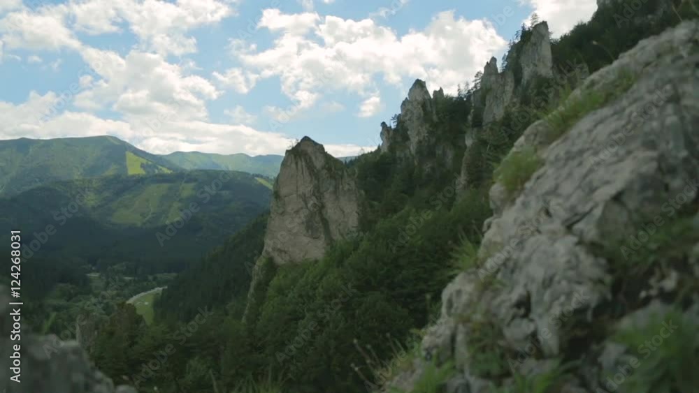 Aerial view of rocky hills with green coniferous trees Aerial view of rocky hills with green coniferous trees