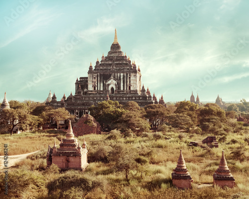 Ancient architecture of old Buddhist Temples at Bagan Kingdom  Myanmar  Burma . White Thatbyinnyu Temple is one of the biggest in Bagan. Travel landscapes and destinations in vintage style.