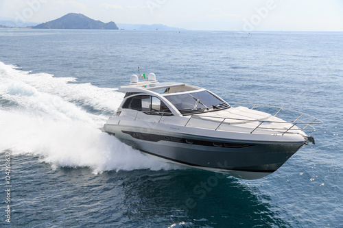 Obraz na płótnie luxury motor boat, rio yachts italian shipyard, aerial view w salonie