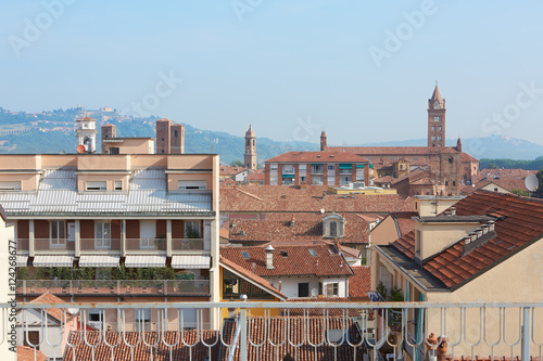 Alba rooftops with cathedral's bell tower view, Italy
