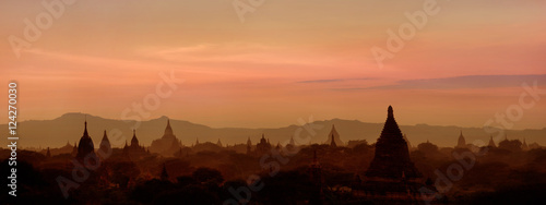 Amazing sunset over ancient architecture of old Buddhist Temples at Bagan Kingdom, Myanmar (Burma). Two images panorama