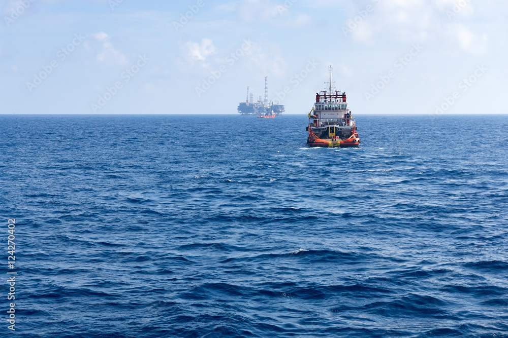 tugboat towing construction barge tugboat towing construction barge