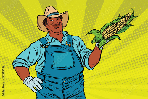 African American farmer with corn on the cob
