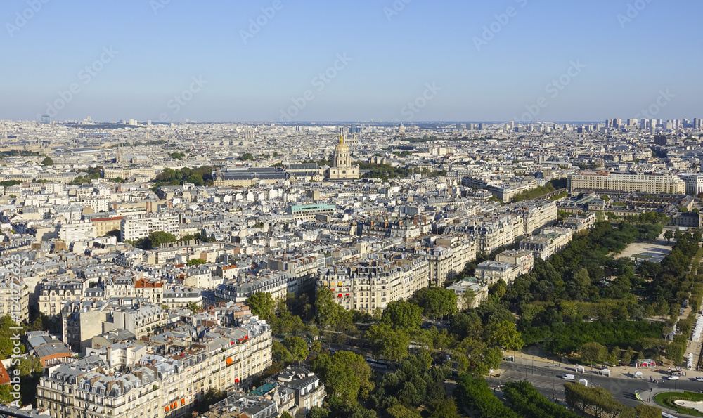 Wide angle view over the city of Paris on a hot summer day - aerial shot
