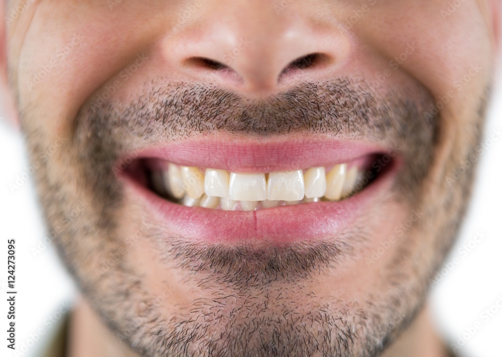 Fototapeta premium Man showing his teeth