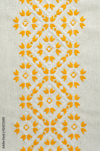Cuadro en lienzo Texture of the vintage homespun linen textile with embroidery