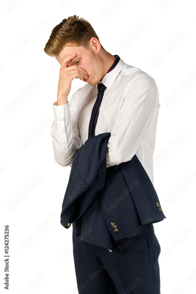 Thoughtful young businessman isolated on white background
