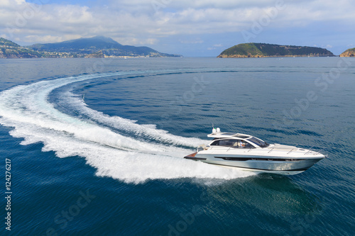 luxury motor boat, rio yachts italian shipyard, aerial view © Andrea