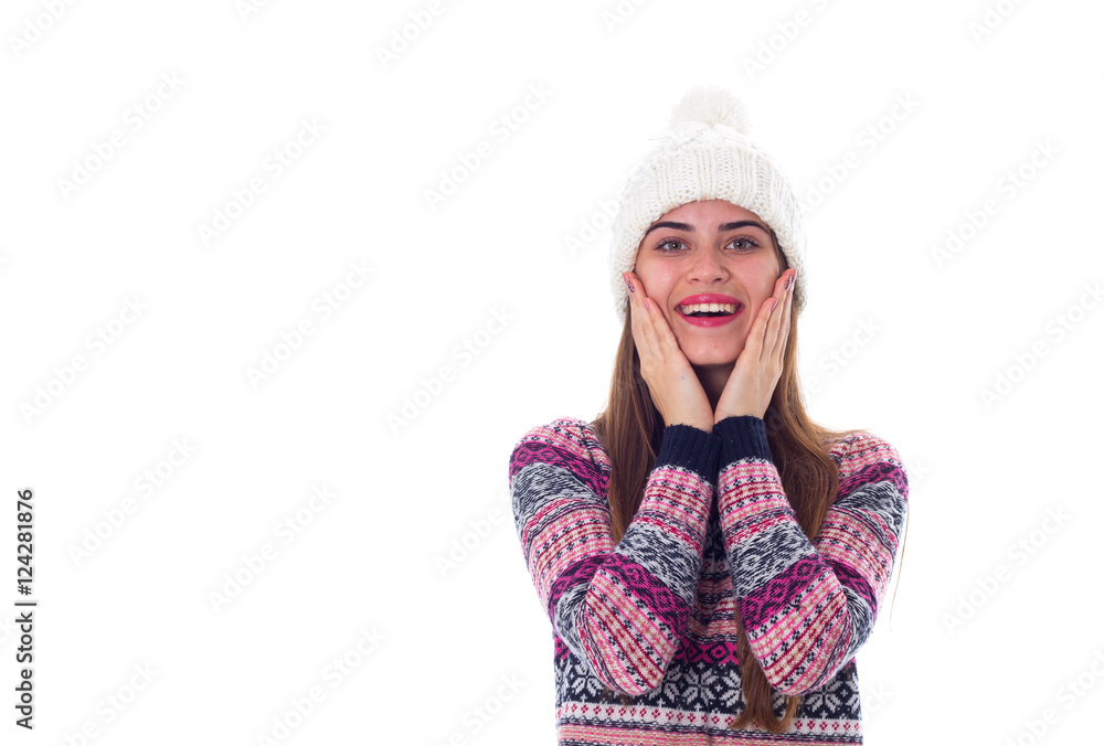 Woman in sweater and white hat