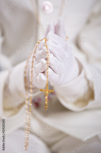 Wallpaper Mural Hands with white gloves holding a gold rosary Torontodigital.ca