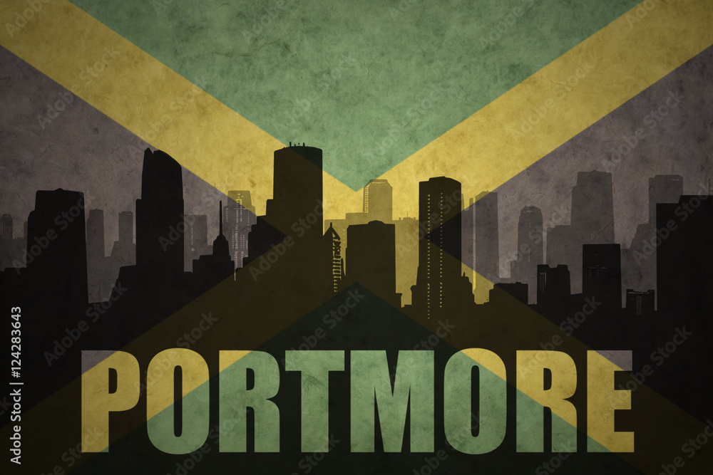 abstract silhouette of the city with text Portmore at the vintage jamaican flag