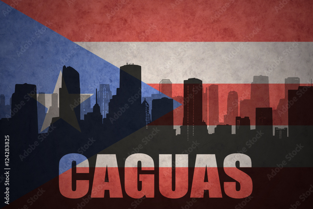 abstract silhouette of the city with text Caguas at the vintage puerto rican flag