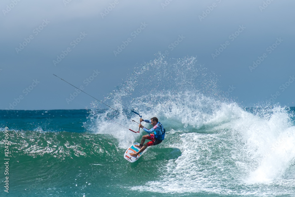 Amazing kite surfing at Philippines. Processional instructor surfing in ocean waives