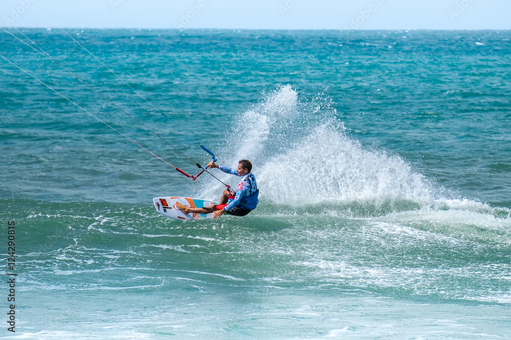 Amazing kite surfing at Philippines. Processional instructor surfing in ocean waives Amazing kite surfing at Philippines. Processional instructor surfing in ocean waives