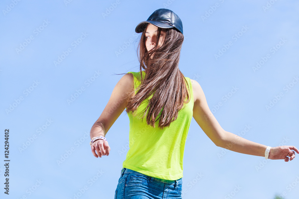 Portrait of pretty teenager girl outdoor.