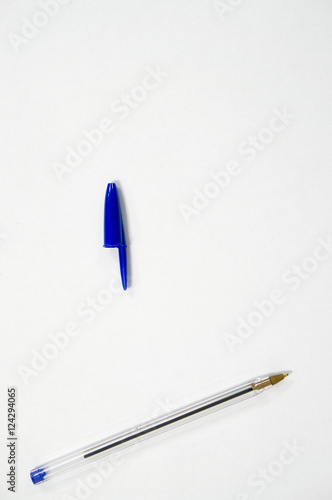 blue pen on white background