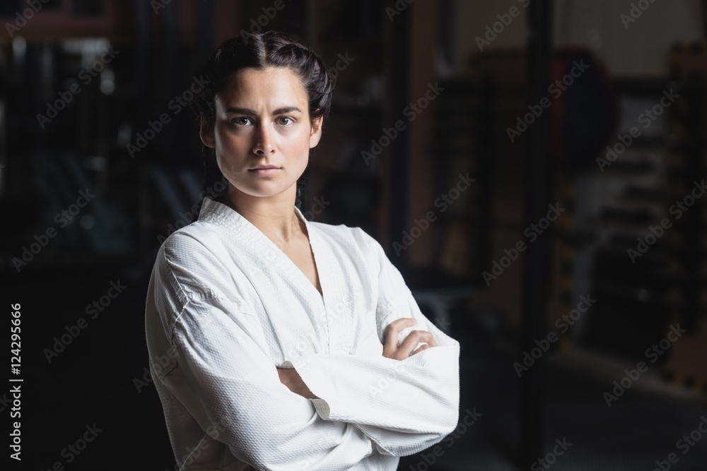 Portrait of woman standing with arm crossed Portrait of woman standing with arm crossed