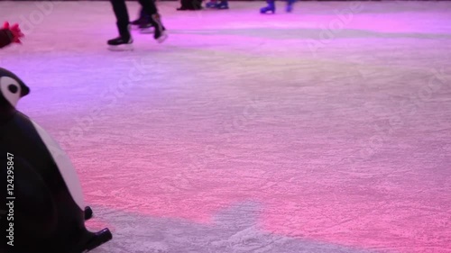 anonymous crowd of people ice skating during the christmas holidays