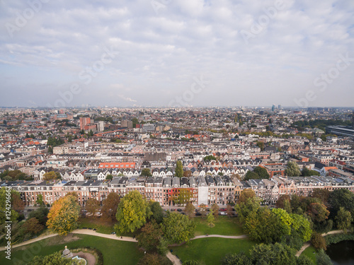Photography Aerial view of Amsterdam city roofs beside Sarphati park