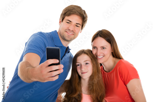Parent Taking Selfie With Their Daughter
