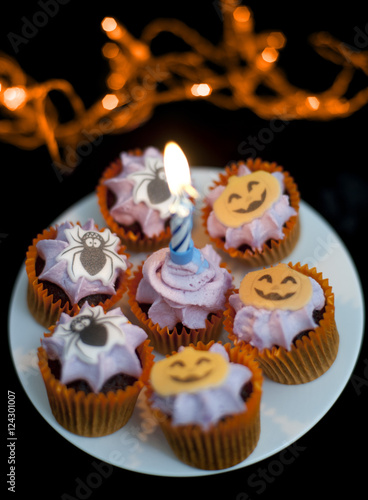 Assorted Halloween cookies with candle