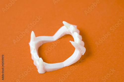 Close-up of fake plastic fangs for Halloween