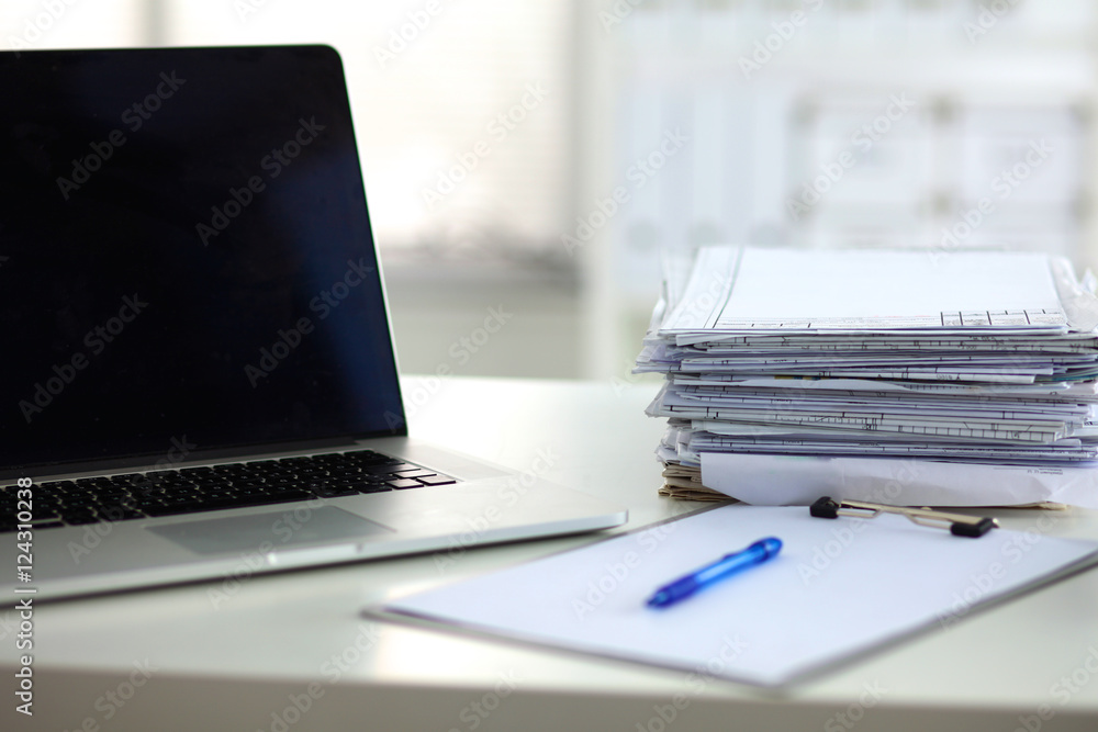 office desk a stack of computer paper reports work forms office desk a stack of computer paper reports work forms