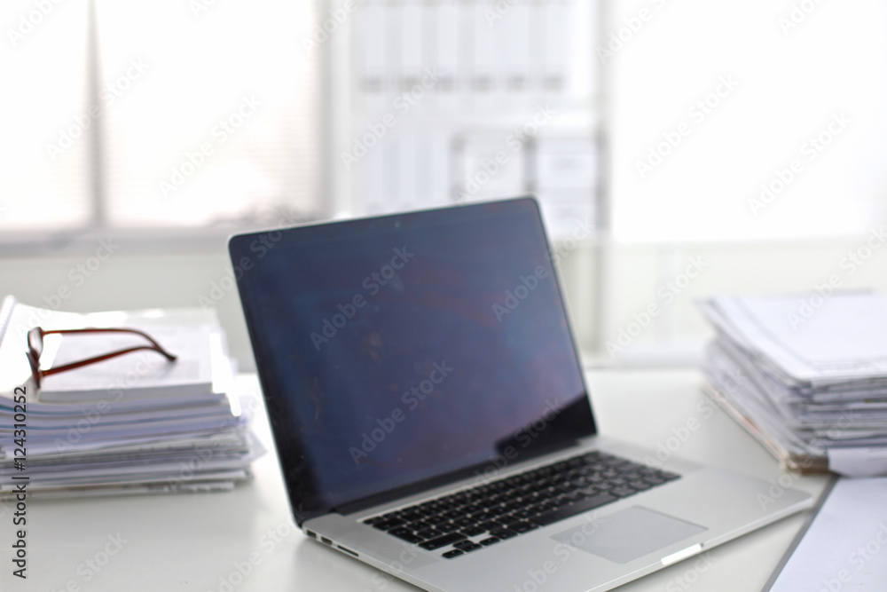 office desk a stack of computer paper reports work forms office desk a stack of computer paper reports work forms
