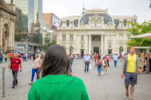 girl happy tourist walking in the square