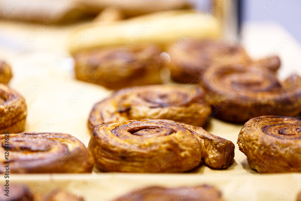 Various buns, lie on the counter for confectionery shop. Actuall Various buns, lie on the counter for confectionery shop. Actuall