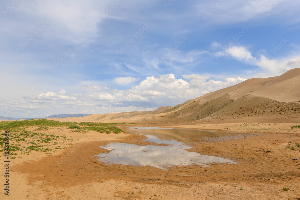Clouds over the Gobi desert, dune Hongoryn, Mongolia