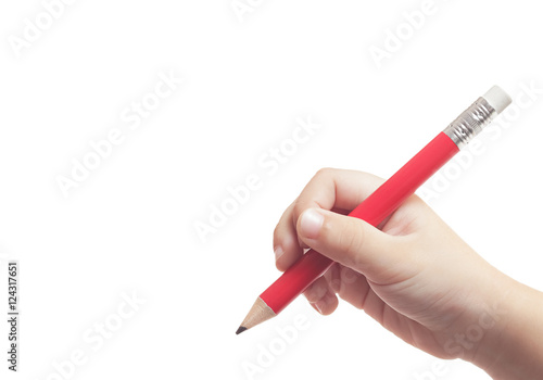 red pencil in hand of child