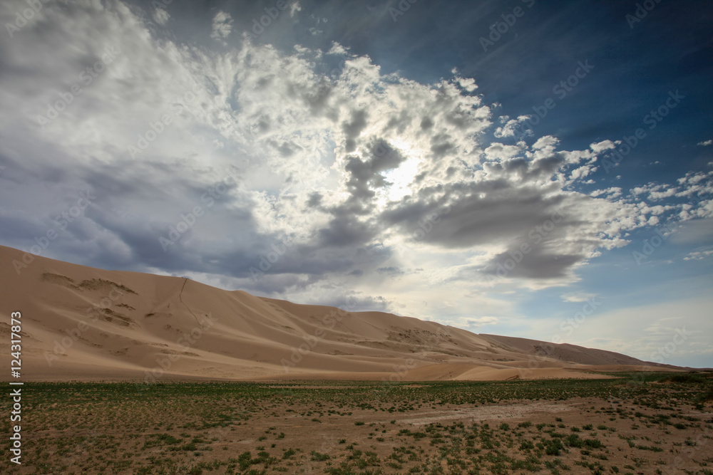 Storm clouds before rain in the Gobi Desert, dune Hongoryn, Mong Storm clouds before rain in the Gobi Desert, dune Hongoryn, Mong
