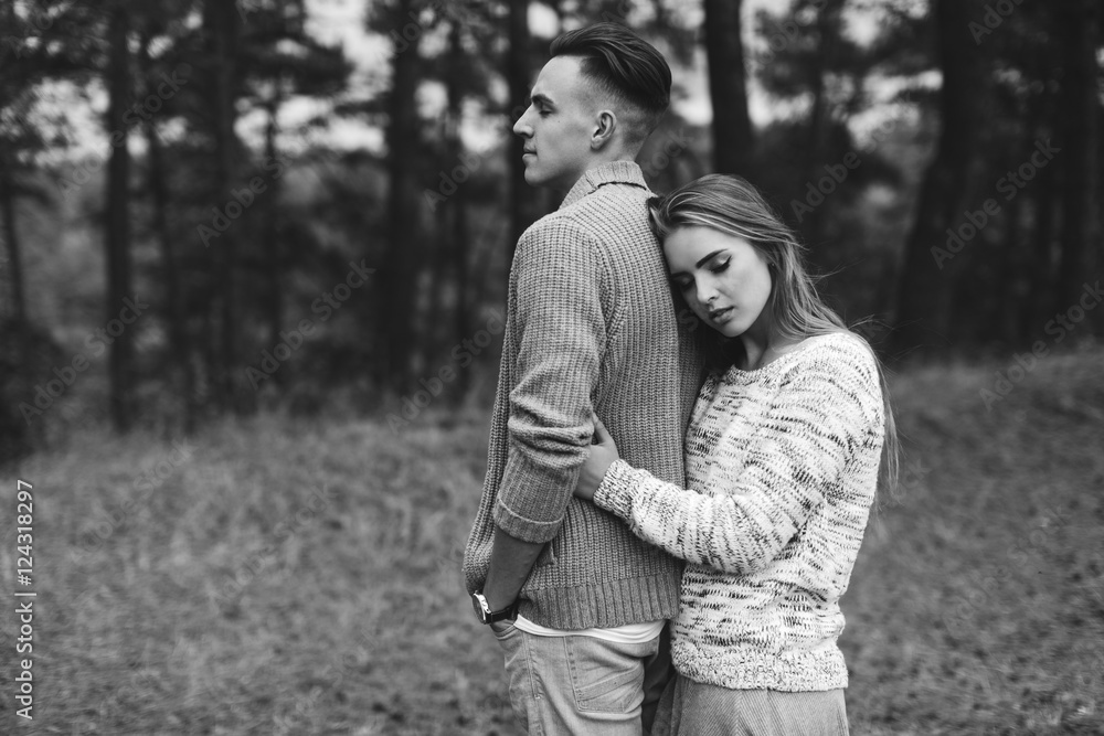 Fototapeta premium Stylish and fashionable young beautiful happy couple posing. Boho style.