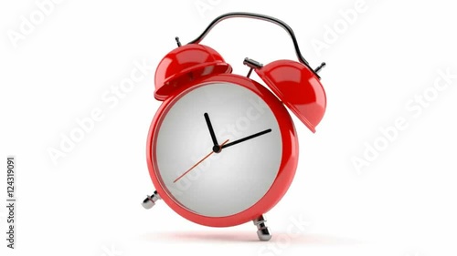 Alarm clock ringing on white