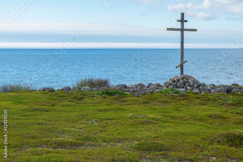 Wooden cross on the shores of the White Sea
