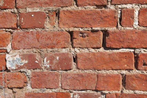 A fragment of an old brick wall