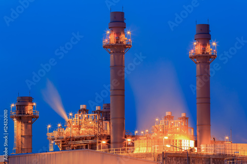 Tower of Gas Combined Cycle Electric Power Plant with Blue Hour © bobo1980