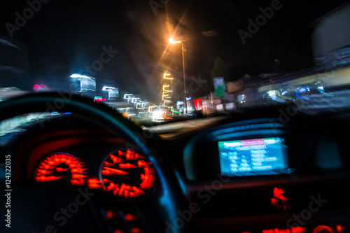 drunk driver goes at night. view from inside. abstract