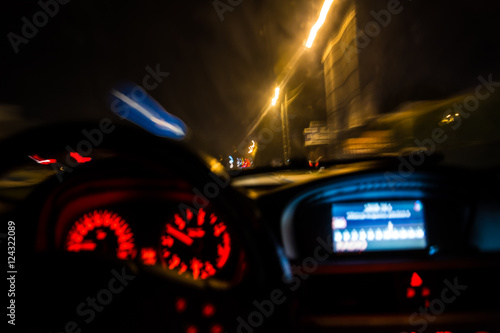 drunk driver goes at night. view from inside. abstract