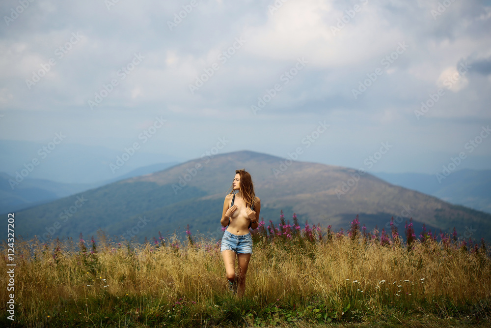 Pretty cute naked girl on field Pretty cute naked girl on field